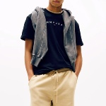 T Shirt Tommy Jeans bleu marine avec logo brodé